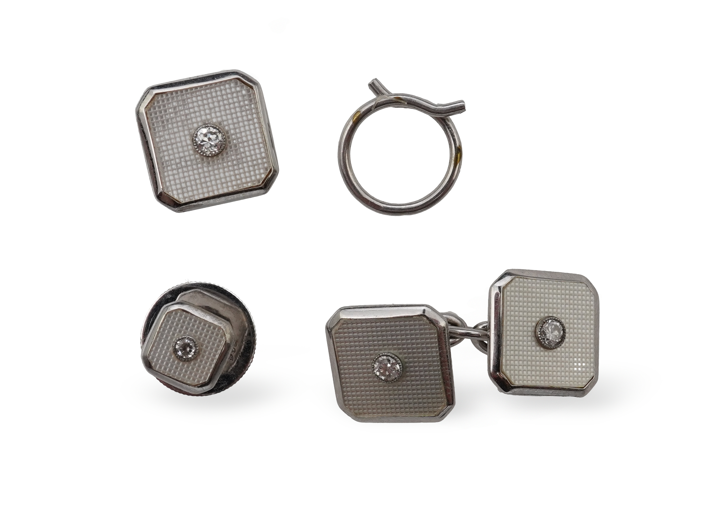 An Art Deco mother of pearl and diamond dress set, circa 1930